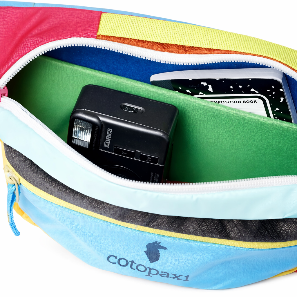 Traveller using the BrightSide 3L Waist Bag during a trip, demonstrating real-world use - travel accessories Australia