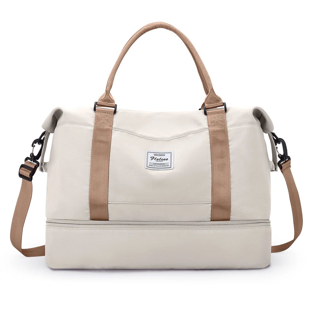 Front View of CoastFly™ Duffel Beige duffel bag with brown straps on a white background