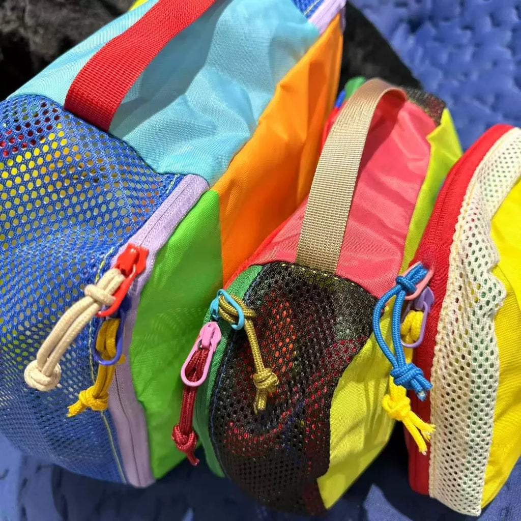 Colorful mesh bags with various straps and closures on a blue background