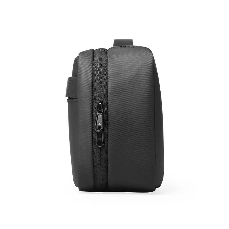 Black travel toiletry bag on a white background