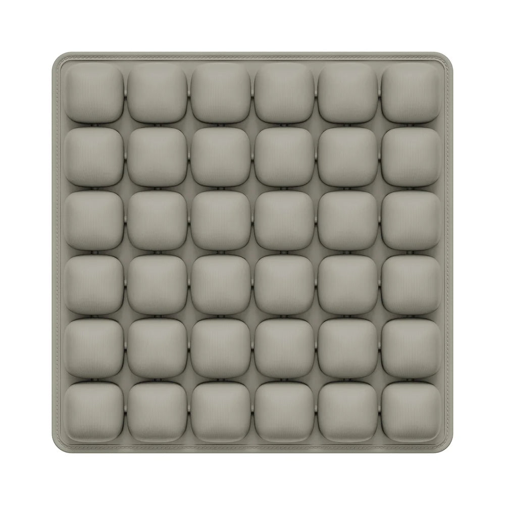 Silicone mold with multiple compartments on a white background