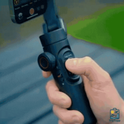 Top-down view of the FocusFlow AI Gimbal showing its compact size for travel - premium travel gear