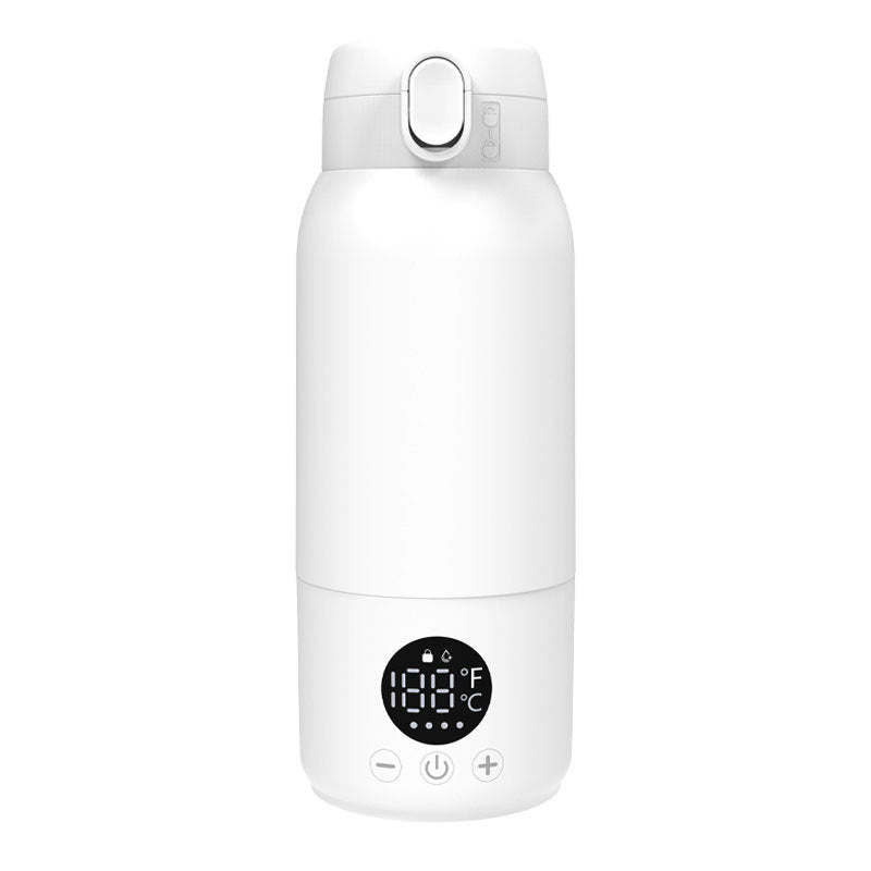 Baby Bottle Warmer placed alongside other travel essentials, ready for a trip - travel essentials