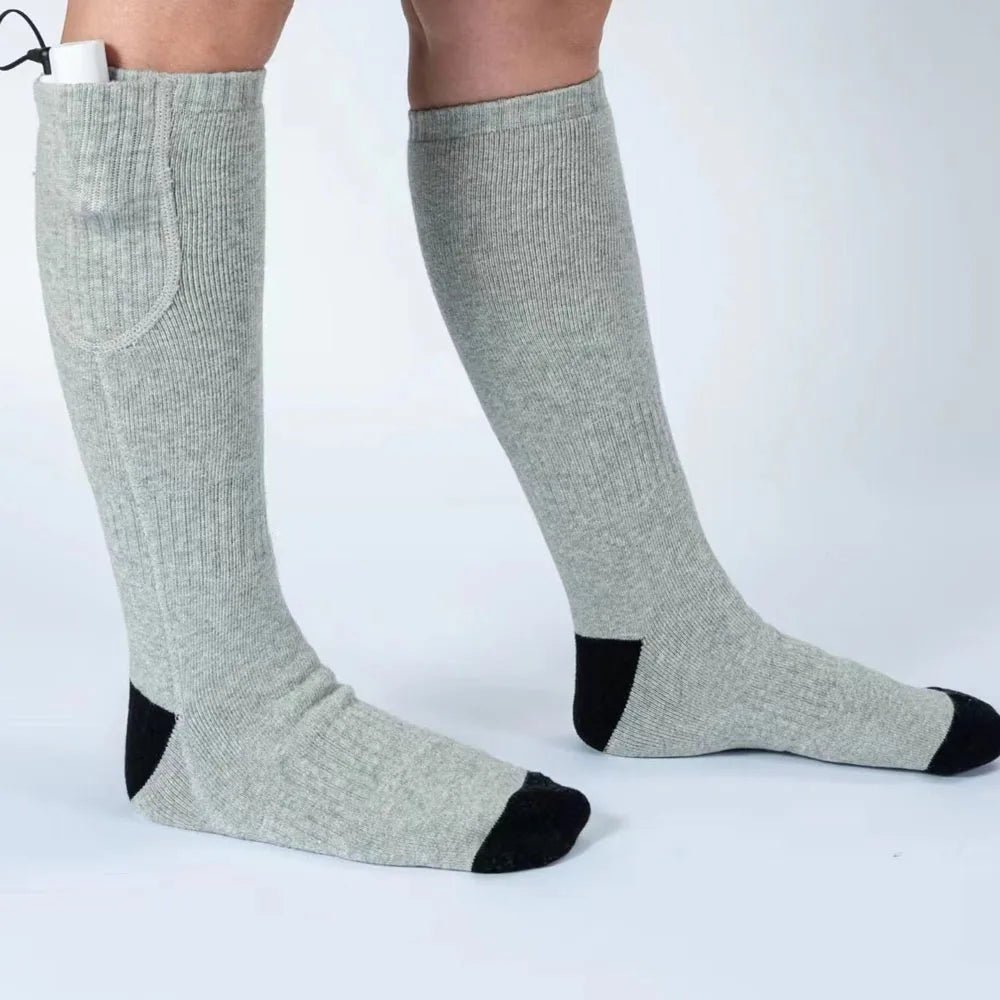 Gray knee-high socks with black toes and cuffs on a white background