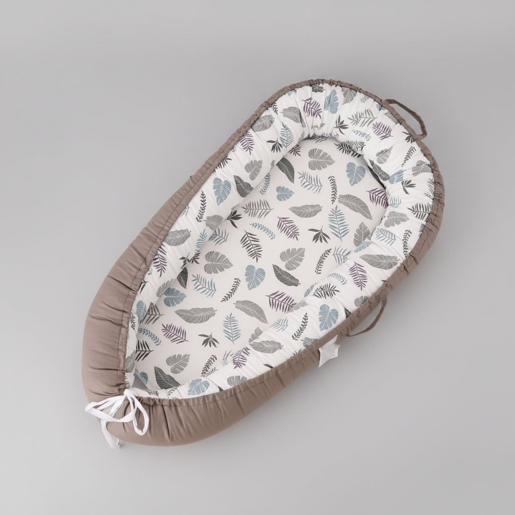 Baby Travel Bed placed alongside other travel essentials, ready for a trip - travel essentials