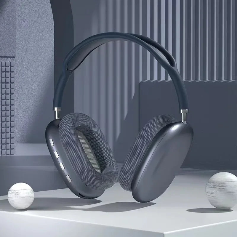 Modern gray headphones on a minimalistic background