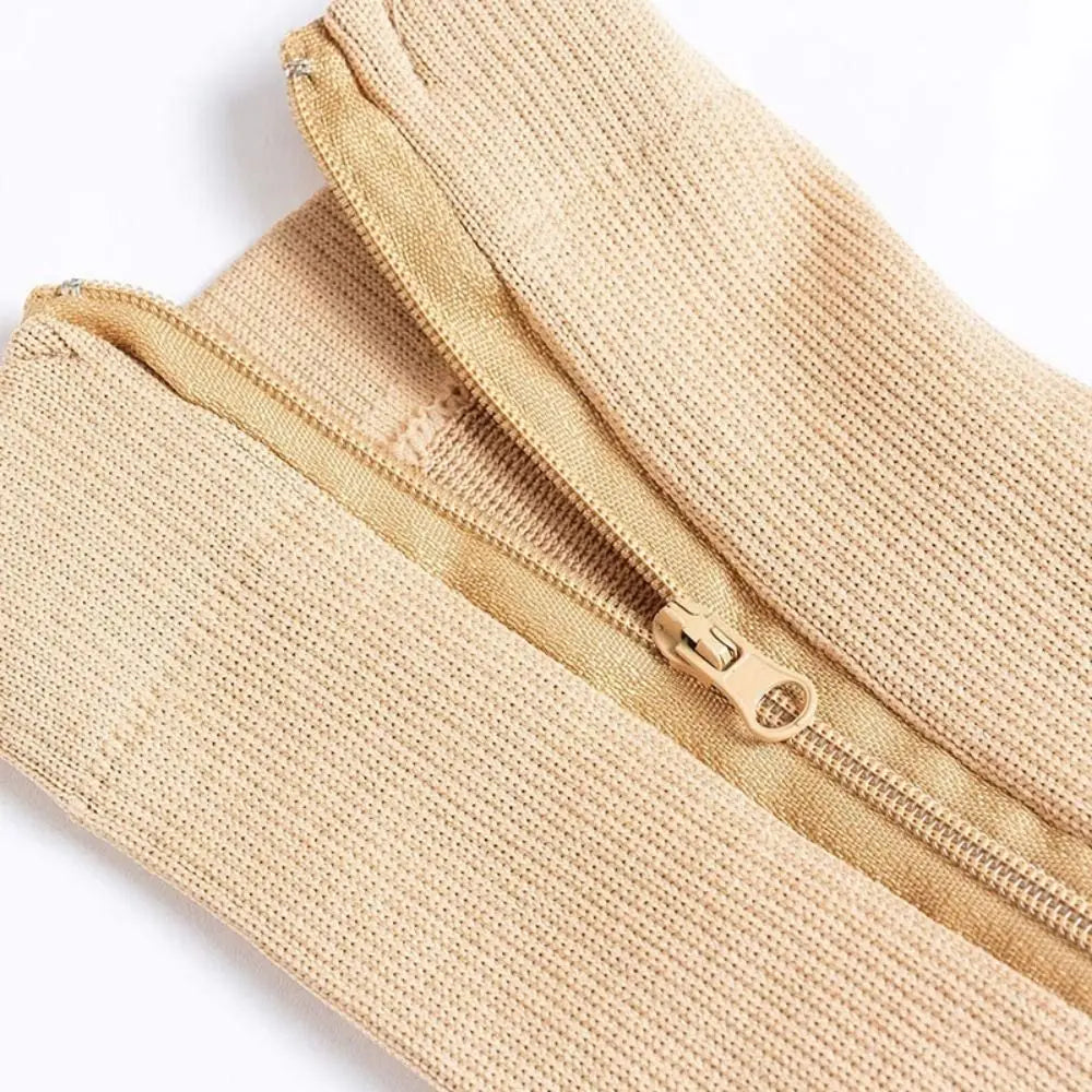 Zipper Compression Socks packed inside a suitcase as part of a travel organiser set - travel essentials