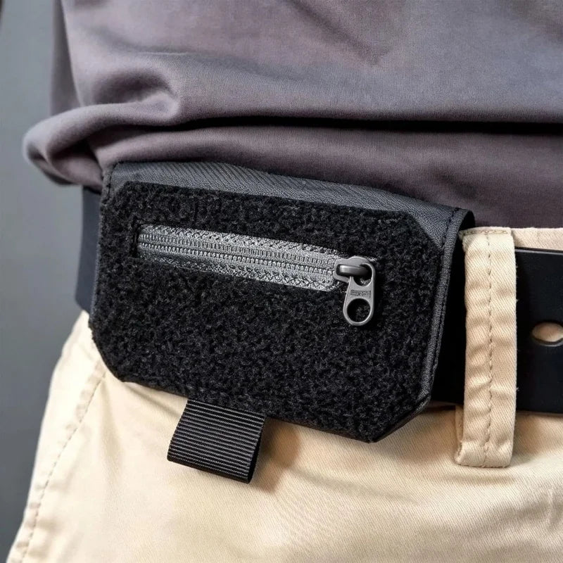 StealthClip anti-theft belt wallet open showing passport cards and cash compartments