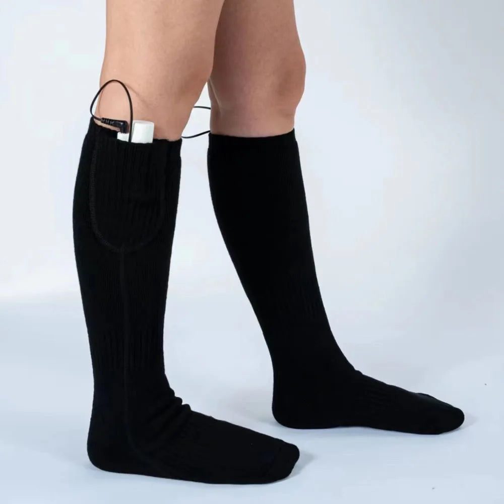 Close-up of the Heated Socks showing key features and build quality - travel accessories for flights