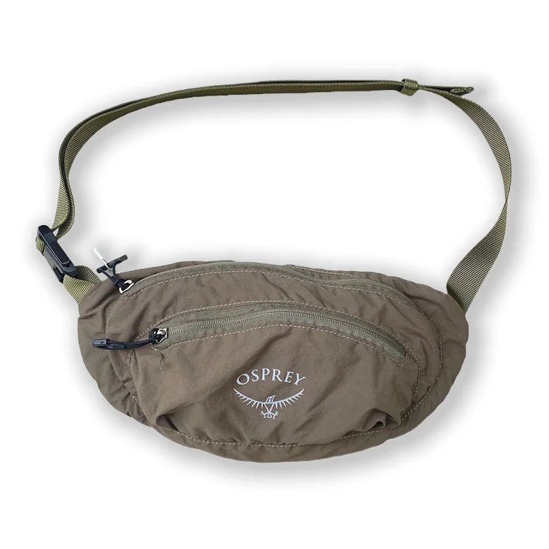 Product image of Brown waist bag with green strap on a white background, featuring Osprey logo.
