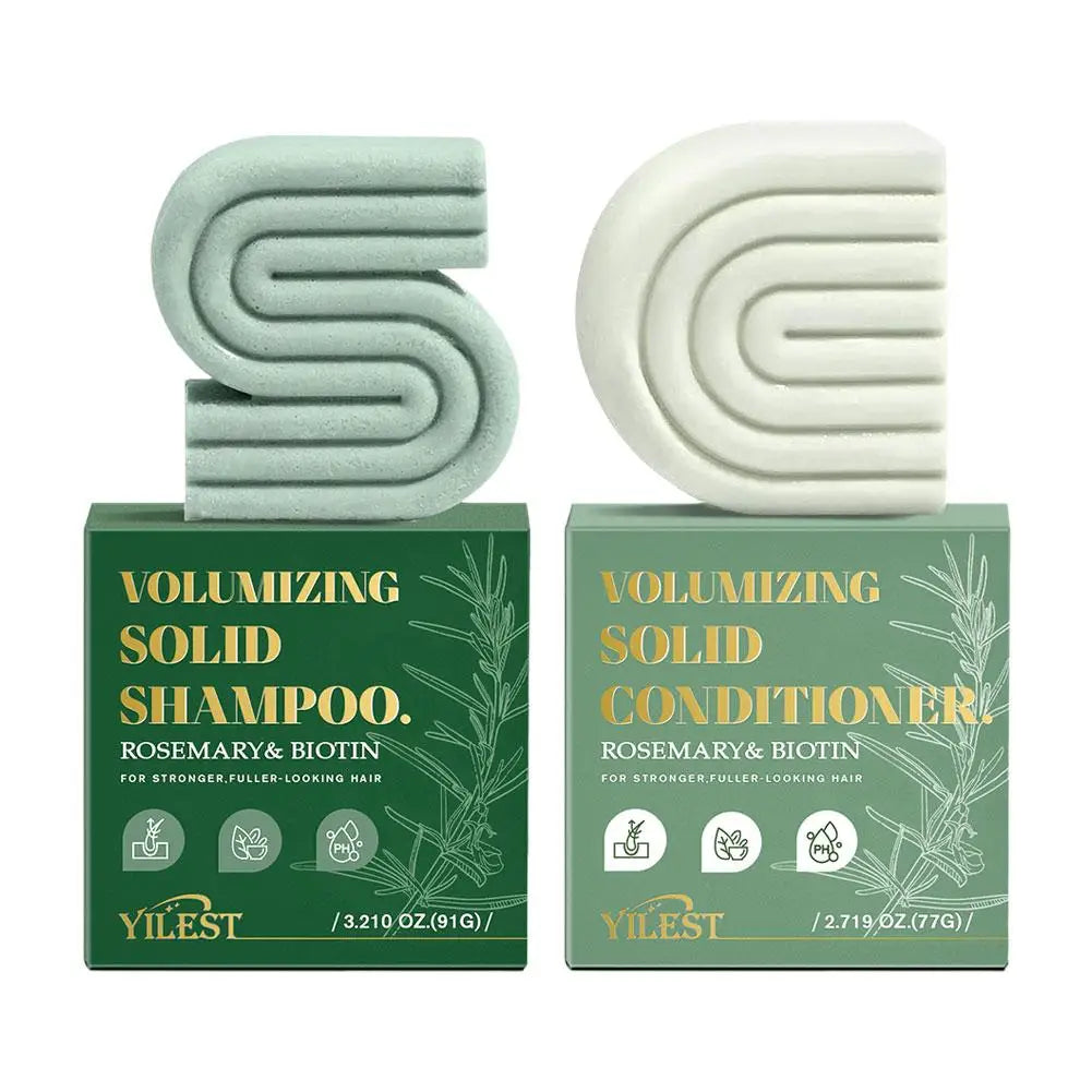 Product image of Volumizing solid shampoo and conditioner bars with green boxes on a white background