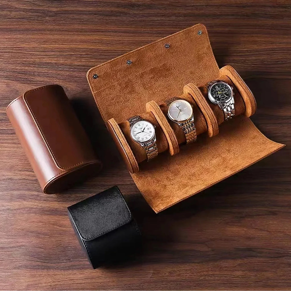Brown leather watch holder with four watches on a wooden surface