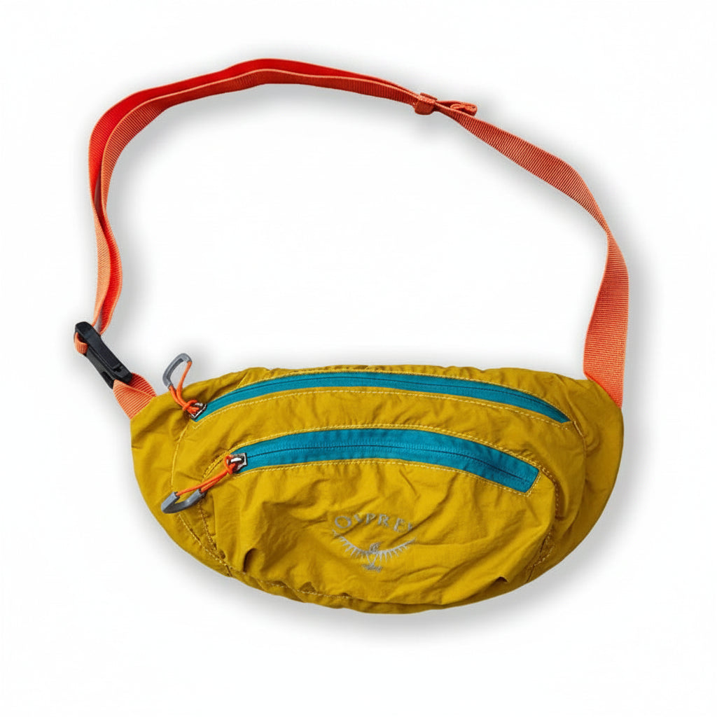 Yellow waist bag with blue zippers and an orange strap - travel gear