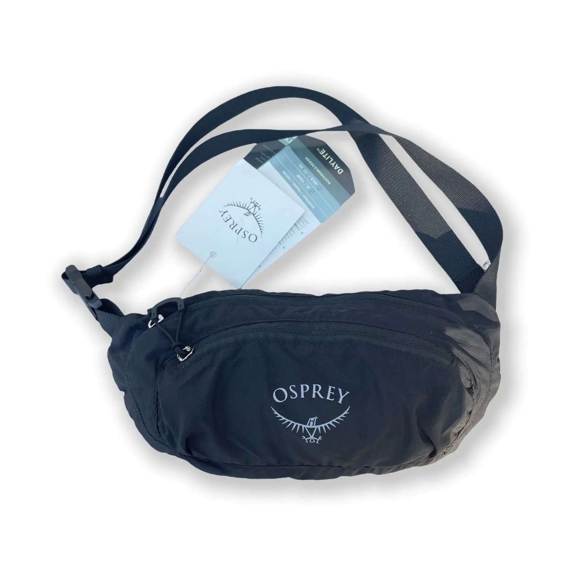 Traveller using the TrailLite Ultra-Light Crossbody Bag during a trip, demonstrating real-world use - travel bag