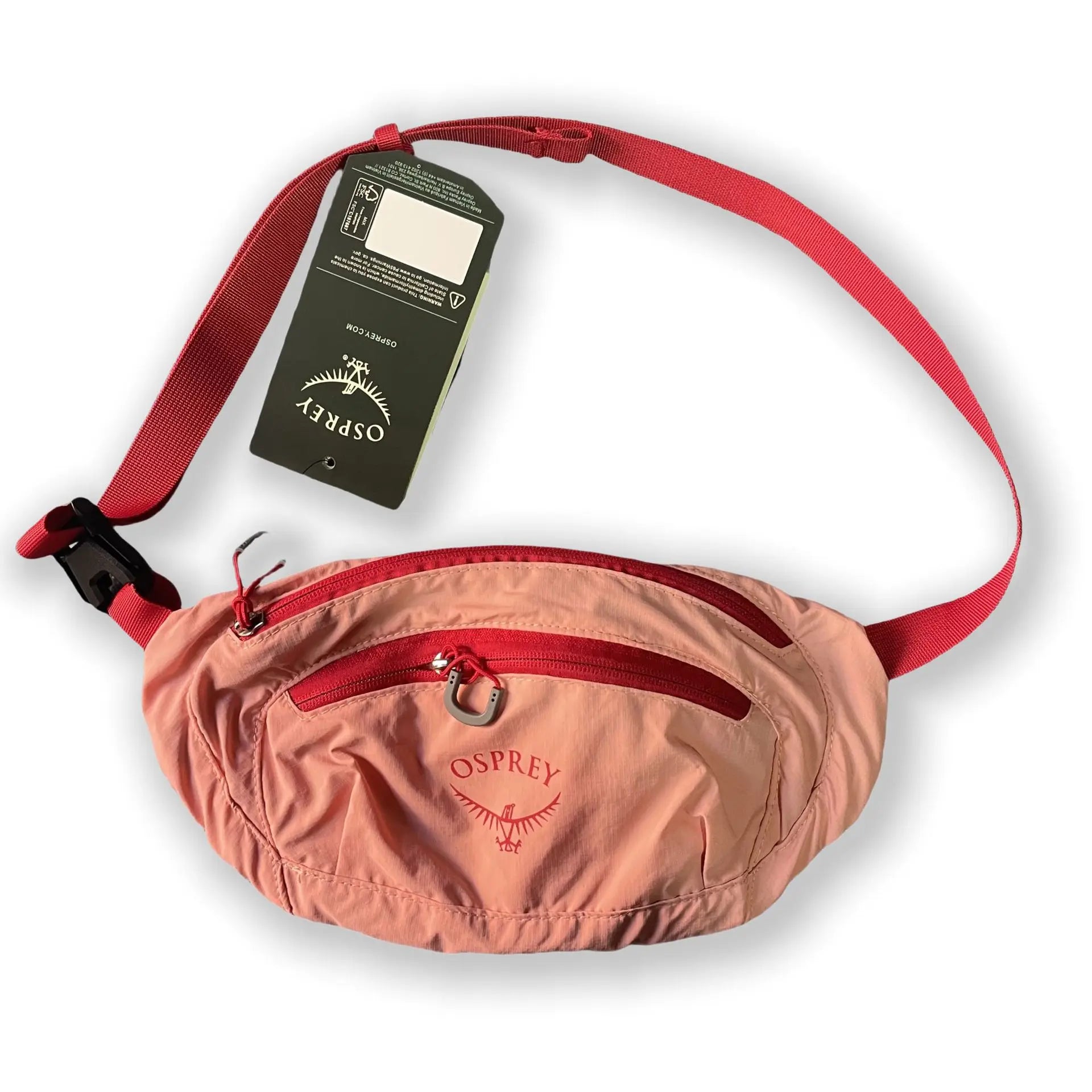 Pink Osprey waist pack with red strap - travel bag