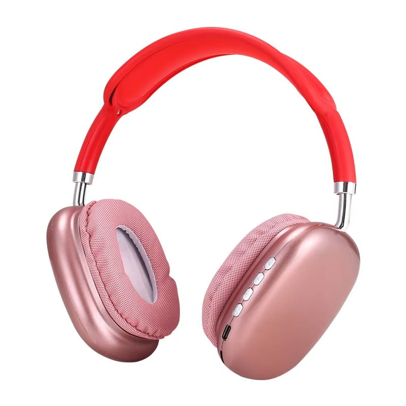 Pink headphones with red headband on a white background