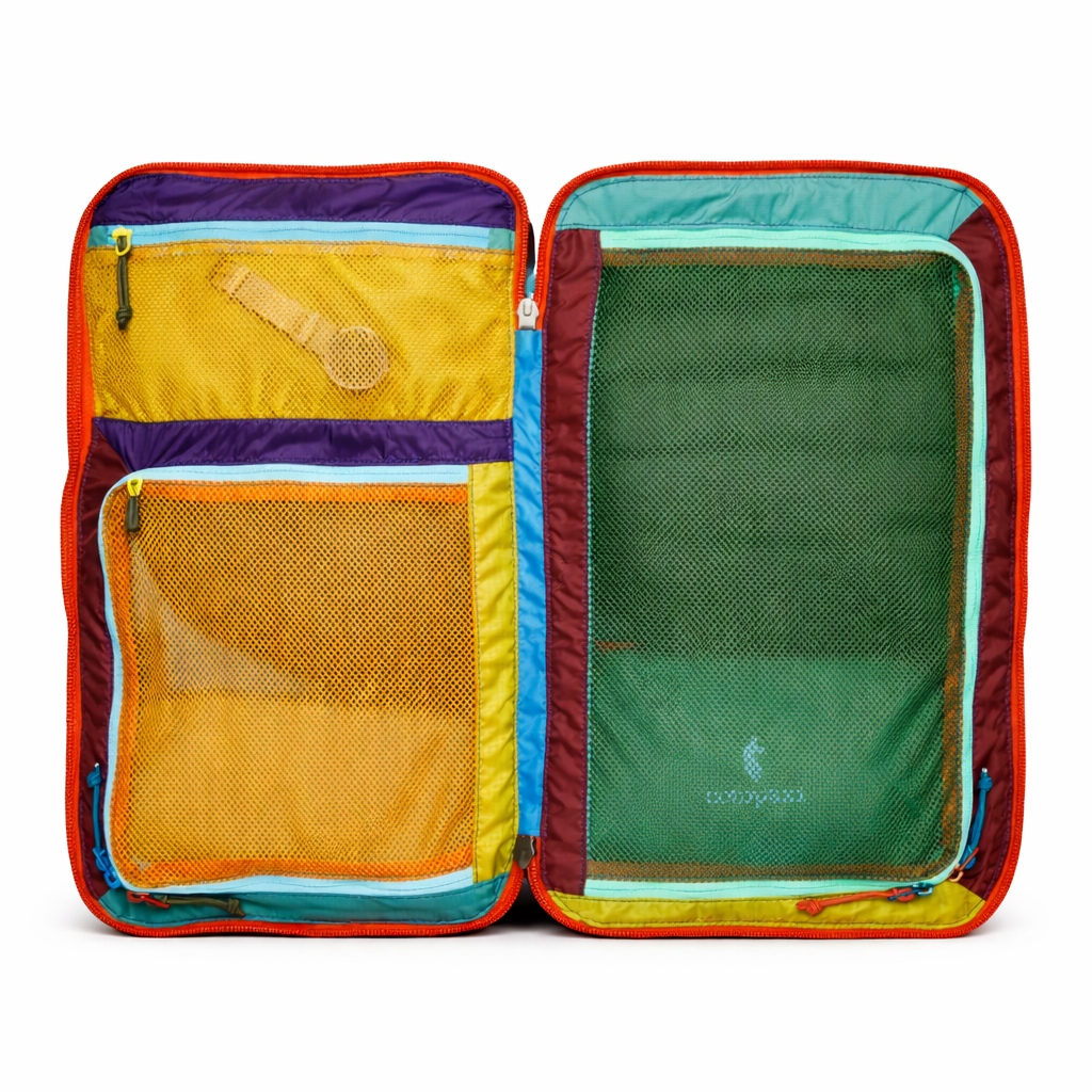 Colorful packing cubes with zippers and mesh pockets on a white background