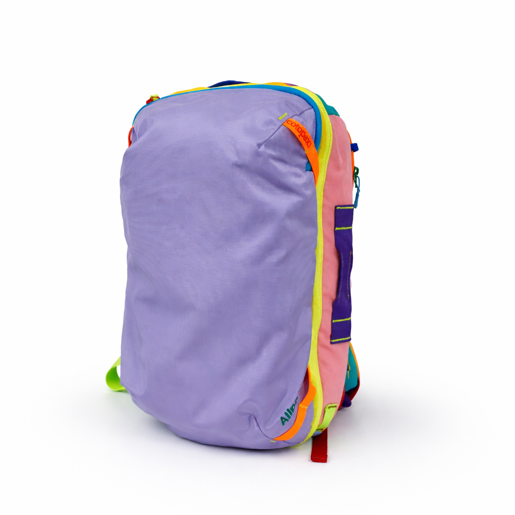VibeTrail28L Backpack shown from the side, highlighting its compact travel design - travel accessories Australia