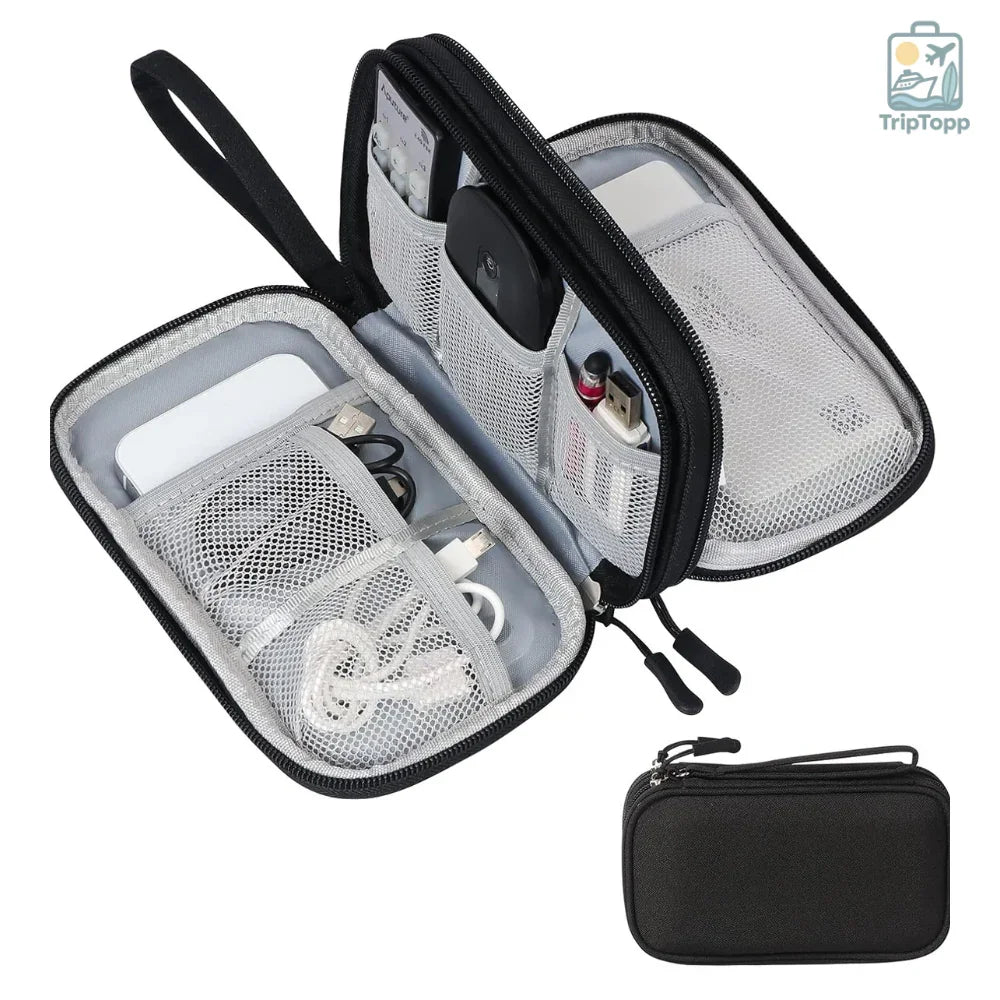 Black travel case with mesh compartments containing electronic devices on a white background WireWay electronics organiser pouch packed inside carry-on luggage for travel