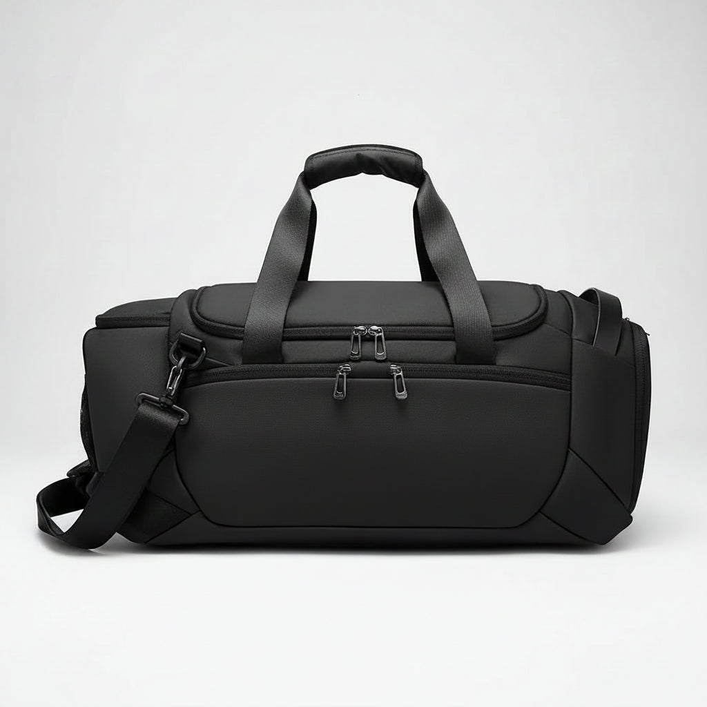 DryMate waterproof duffel bag in black with top carry handles and shoulder strap