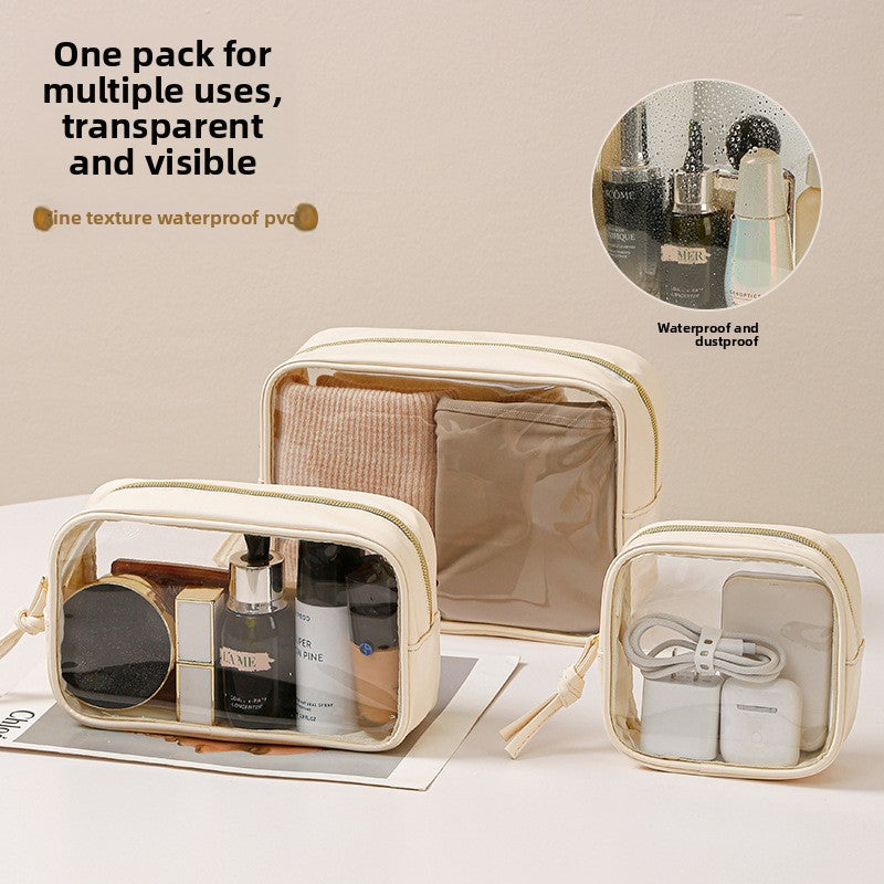 Clear travel toiletry bag open showing cosmetics makeup organised sizes