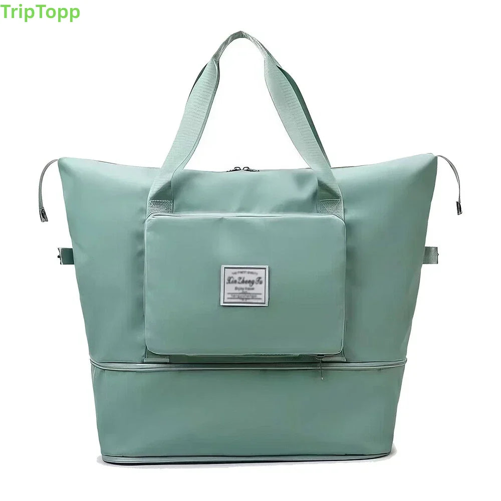 Light blue tote bag with a smaller pouch, featuring the brand 'TripTopp' - travel essentials