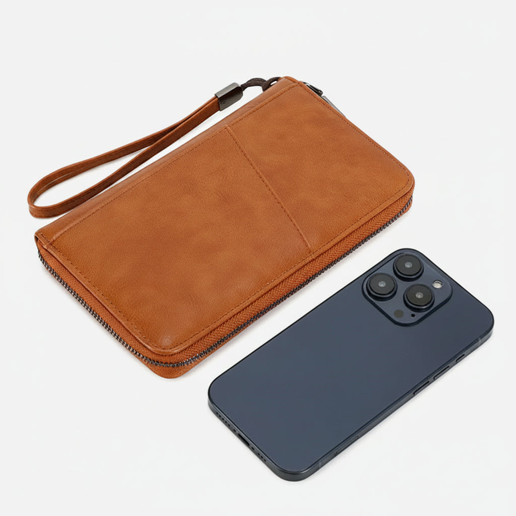 Brown leather wallet with dimensions and a smartphone for scale on a white background