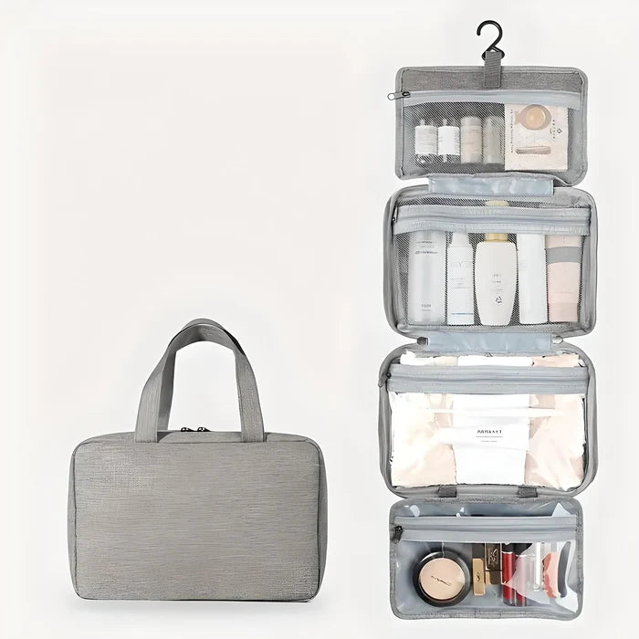 Waterproof toiletry bag open showing organised compartments for skincare and grooming