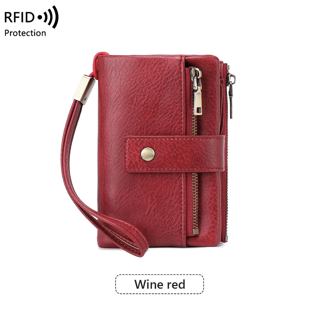 Red wallet with strap and RFID protection feature on a white background