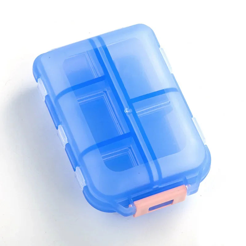Blue pill organizer on a white background