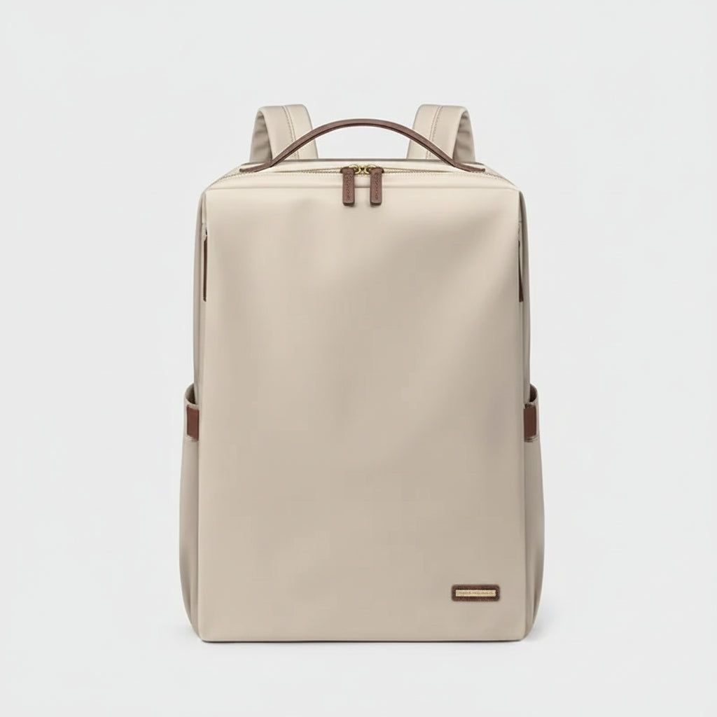 Beige backpack with brown accents on a white background