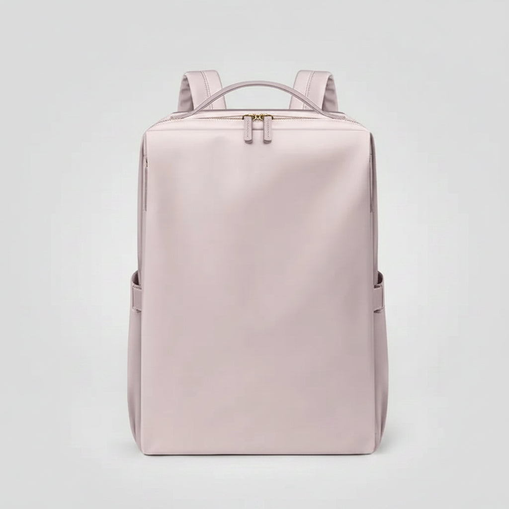 Pink backpack on a white background